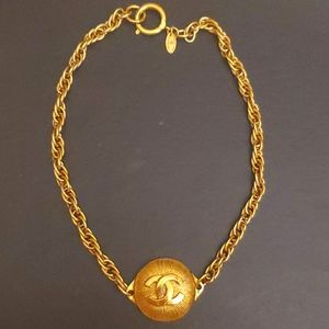 Chanel Stamped Gold Plated CC Sunburst Pendant